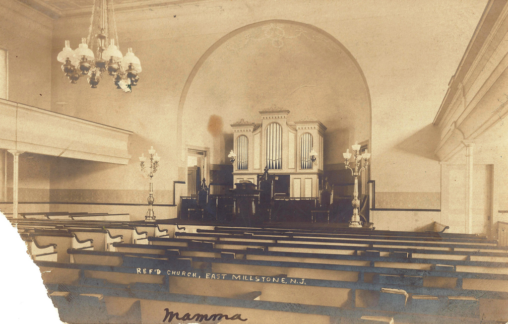 A photo of the organ in its original placement in our church